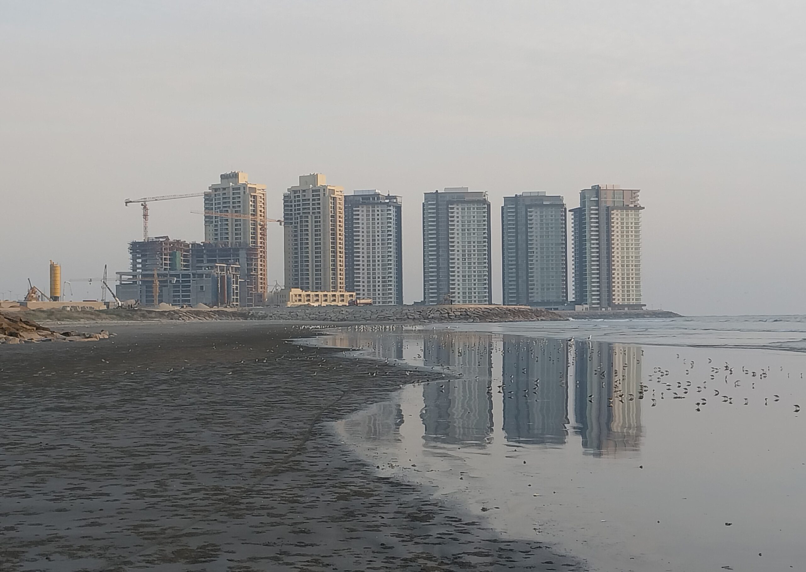 Towers at Emaar Oceanfront, then sold as Crescent Bay, seen from the DHA Phase 8 beach in December 2022
