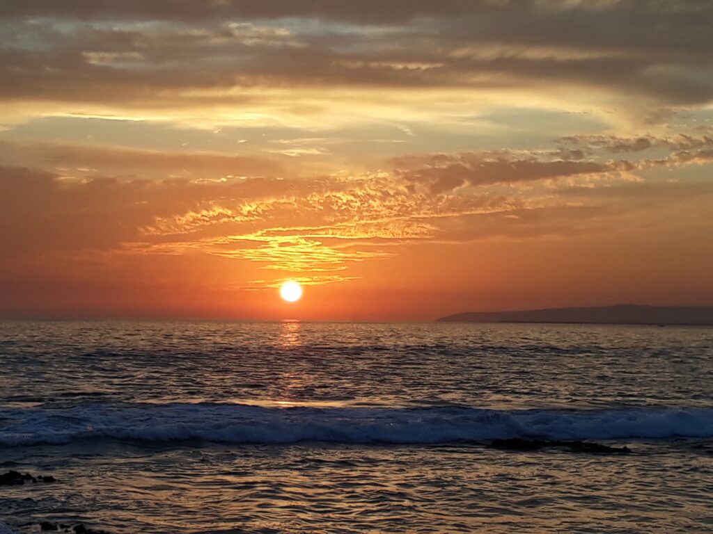 The sun sets over the Arabian Sea at Sandspit